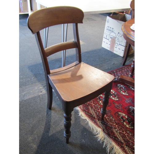 1019 - Three Victorian mahogany dining chairs, solid seats