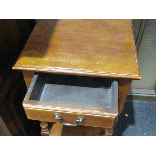 1045 - A pair of Georgian style oak side tables, single drawer with swan neck handles over turned supports ... 