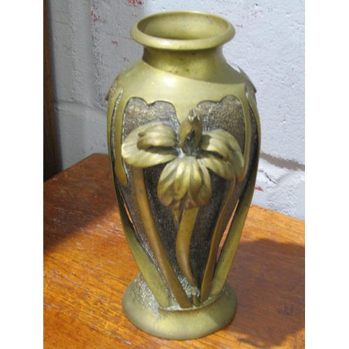 1046 - A pair of late Victorian Oriental metal iris vases, 21cm tall (character marks to base)