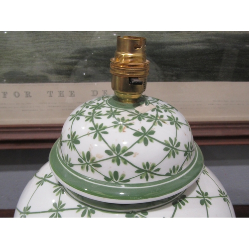 1048 - A pair of large baluster form table lamp bases with green and white foliate pattern