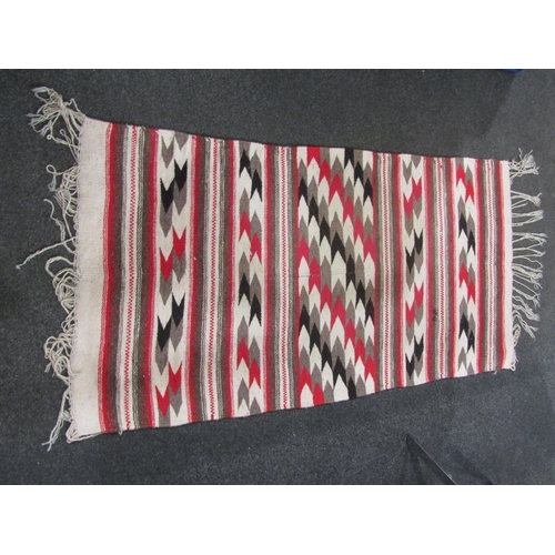 1563 - Three rugs, Eastern red and brown ground geometric design (worn), 140cm x 95cm, American style with ... 