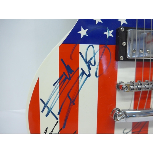 8288 - The Rolling Stones signed guitar - A Les Paul style electric guitar in American stars and stripes fi... 