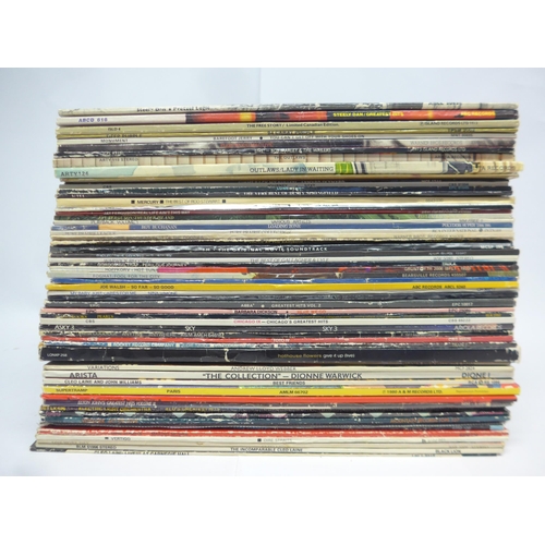 8223 - A varied collection of approximately sixty LPs, artists include Fleetwood Mac, Steely Dan, ELO, The ... 