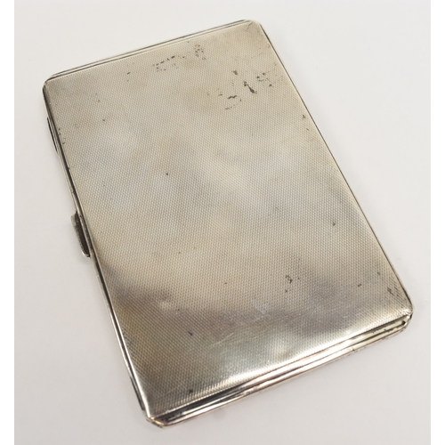 8054 - A William Neale silver deco engine turned cigarette case, monogrammed JRM, worn dented state, inscri... 