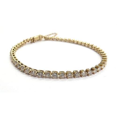 6017 - A diamond tennis bracelet, 50 diamonds, total weight 2.50ct, 14k, 18cm long, 6.9g