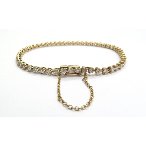 6017 - A diamond tennis bracelet, 50 diamonds, total weight 2.50ct, 14k, 18cm long, 6.9g