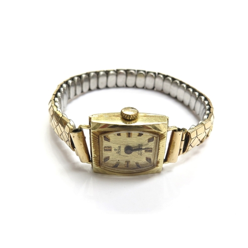 6131 - A gold cased wristwatch stamped 585 with metal strap, 14.7g total