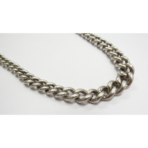 6559 - A silver watch chain, 40cm long each graduated link stamped, later metal clasps