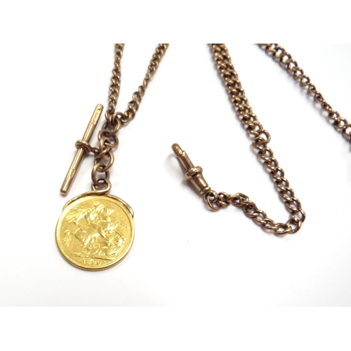 6543 - A 9ct gold watch chain with T-bar, each link stamped 375, 9ct, 43cm long, hung with an 1889 gold sov... 