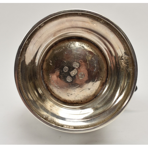 8012 - A George III silver hot water jug/coffee pot.  The body decorated in high relief with birds, flowers... 