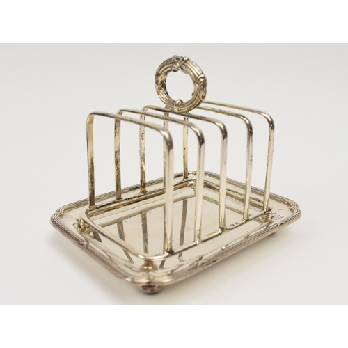 8026 - A silver Elkington & Co five-bar toast rack with integral tray, Birmingham 1926, 10cm tall x 12cm lo... 