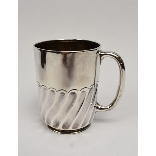 8027 - A Goldsmiths & Silversmiths Company silver half pint tankard with wrythen body monogrammed HML, date... 