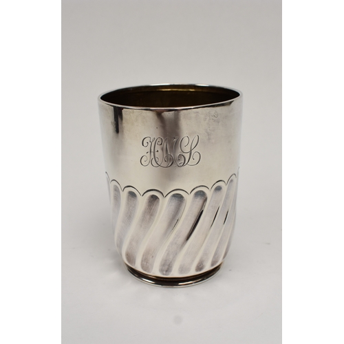8027 - A Goldsmiths & Silversmiths Company silver half pint tankard with wrythen body monogrammed HML, date... 