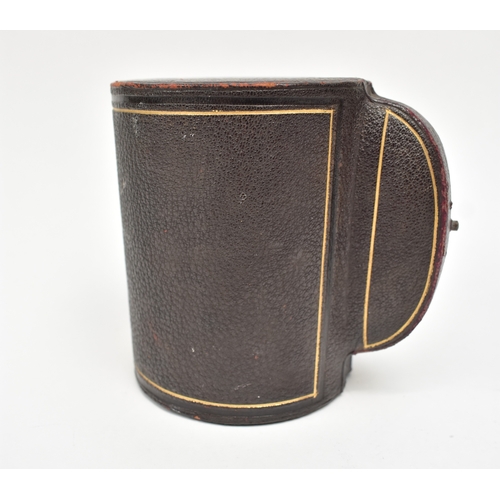 8027 - A Goldsmiths & Silversmiths Company silver half pint tankard with wrythen body monogrammed HML, date... 