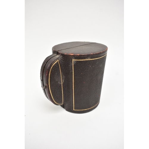 8027 - A Goldsmiths & Silversmiths Company silver half pint tankard with wrythen body monogrammed HML, date... 