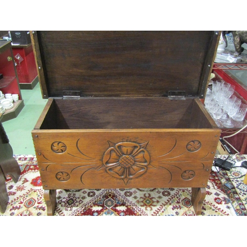 4007 - A mid-20th Century oak blanket box, carved Tudor Rose decoration, on shaped feet. 76cm long x 34cm d... 