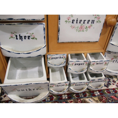 4010 - A Dutch beech and twelve ceramic drawer spice cabinet with single door egg crock for sixteen eggs, 4... 