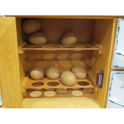 4010 - A Dutch beech and twelve ceramic drawer spice cabinet with single door egg crock for sixteen eggs, 4... 