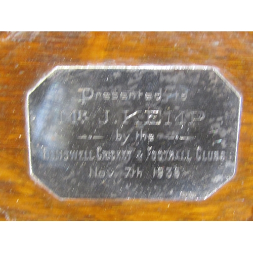 4012 - A galleried oak trophy tray with central plaque stamped 