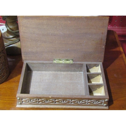4031 - A carved treen box, lidded container and two table lamps (4)