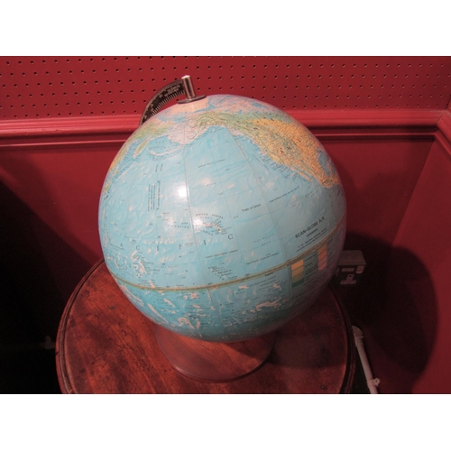 4034 - A table-top World globe on wooden base, 40cm tall