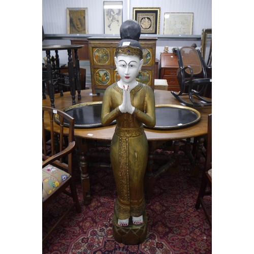 2004 - A carved Oriental female figure, painted