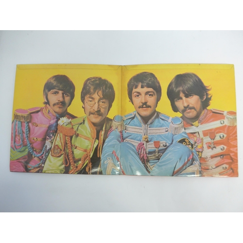 8166 - THE BEATLES: 'Sgt. Pepper's Lonely Hearts Club Band' LP, original 1967 UK mono pressing with black/y... 