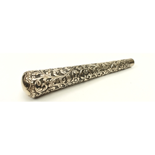 8016 - A highly ornate white metal cane handle, 15.5cm long