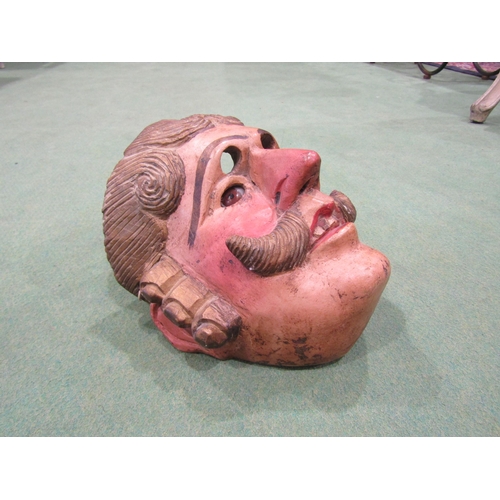 4060 - Two South American wooden masks, a Bull and a painted gent with moustache
