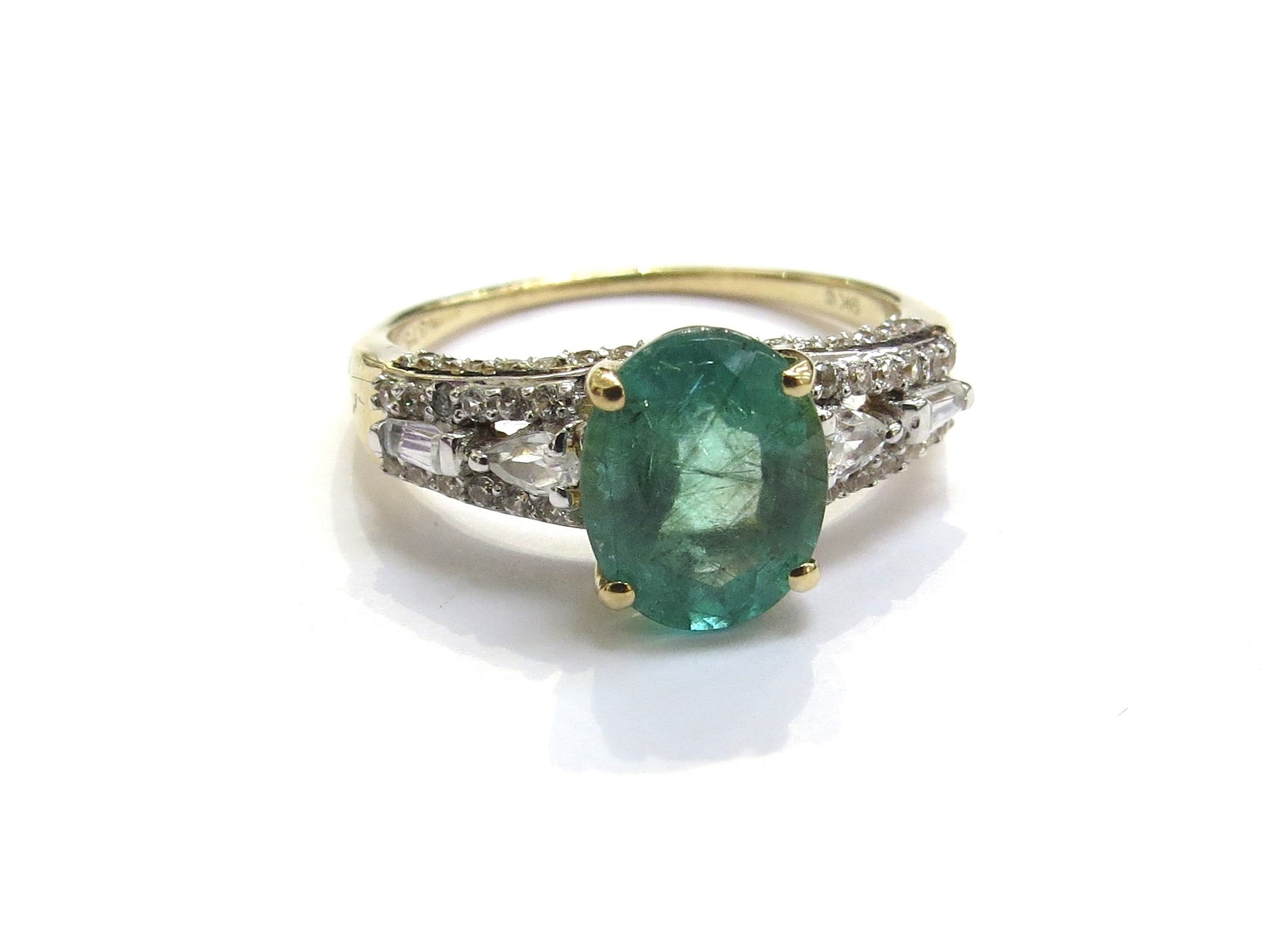 A 9ct gold Zambian emerald and white zircon Tomas Rae ring. Size O, 2.7g
