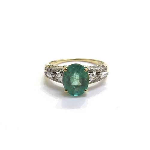 A 9ct gold Zambian emerald and white zircon Tomas Rae ring. Size O, 2.7g