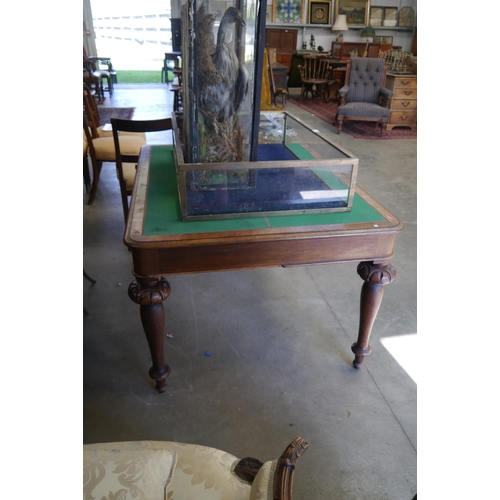 2003 - A Victorian mahogany partners desk with green baize top, four drawers on slender graduating legs, on... 