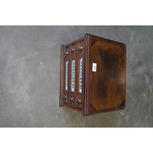 2007 - An Edwardian three drawer table top needle chest with reverse gilt painted panels to each drawer
