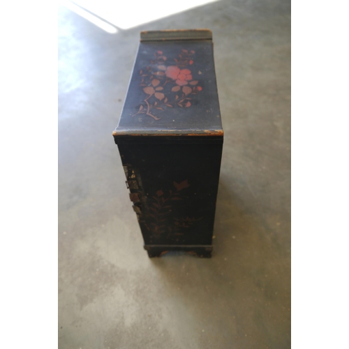 2010 - An Oriental lacquered jewellery chest, missing door