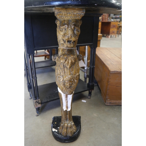 2011 - A pair of gilt and gesso lion demilune side tables, a/f