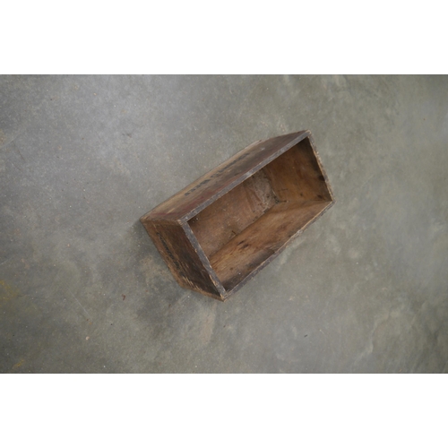 2032 - A pine box labelled 