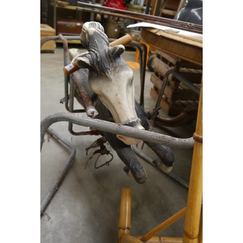 2034 - A vintage Mobo rocking horse on frame