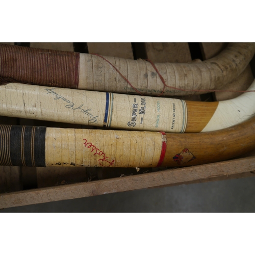 2036 - Three bygone hockey sticks