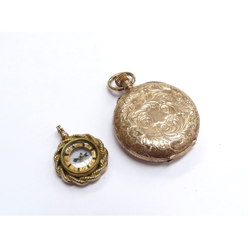 6132 - A gold fob watch with engraved back marked 9k and a gold compass fob, unmarked (a/f), 31.7g total