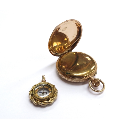 6132 - A gold fob watch with engraved back marked 9k and a gold compass fob, unmarked (a/f), 31.7g total