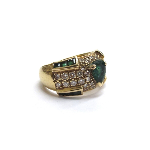 6046 - A gold emerald and diamond ring, stamped 750. Size L, 6.5g