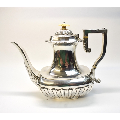 8037 - An F.B. & Co silver teapot with melon fluted body, Birmingham 1904, ivory knop and insulators.  21.5... 