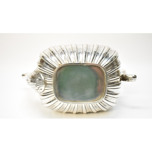 8037 - An F.B. & Co silver teapot with melon fluted body, Birmingham 1904, ivory knop and insulators.  21.5... 