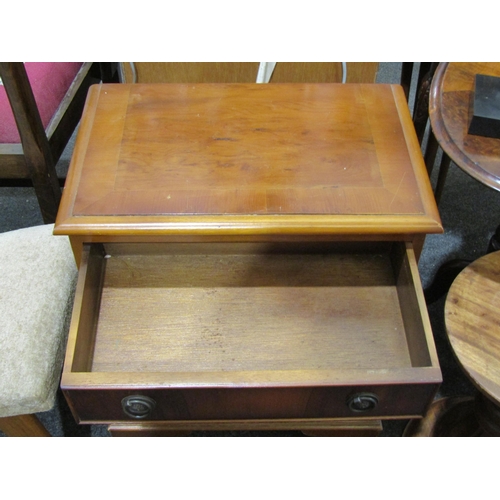 1038 - A pair of 20th Century yew wood miniature chests of four drawers, 63cm tall x 49cm wide x 31cm deep