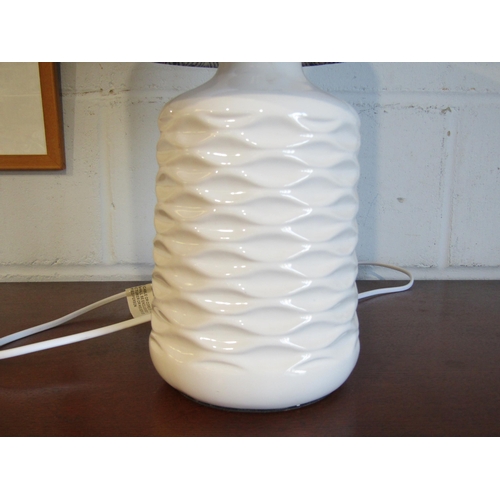 1012 - A pair of John Lewis ceramic table lamps, modernist form with blue and white shades