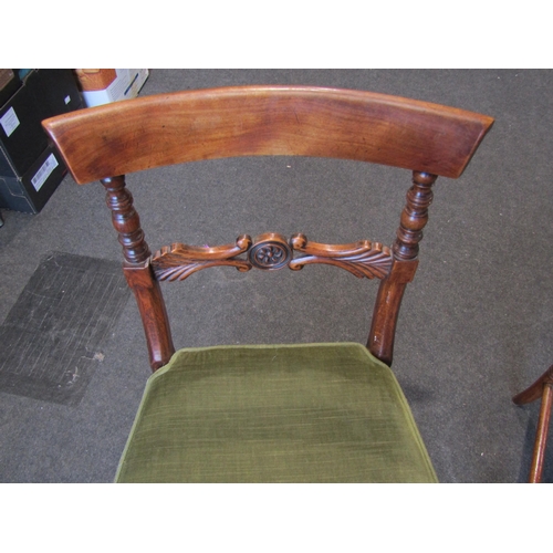 1017 - A set of four early Victorian side chairs, fancy carved back splats on stretcher bases