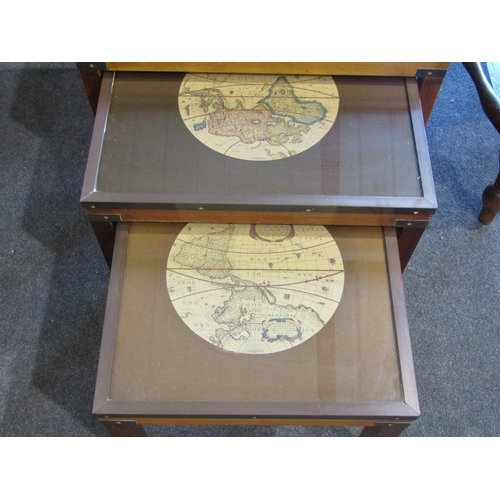 1019 - A nest of three occasional tables with World map tops, largest 47cm tall x 64cm wide x 46cm deep