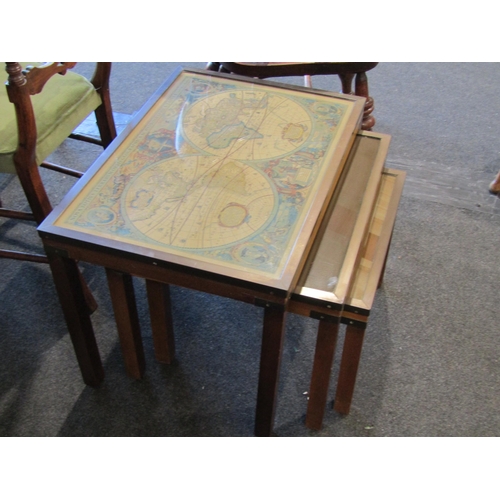 1019 - A nest of three occasional tables with World map tops, largest 47cm tall x 64cm wide x 46cm deep