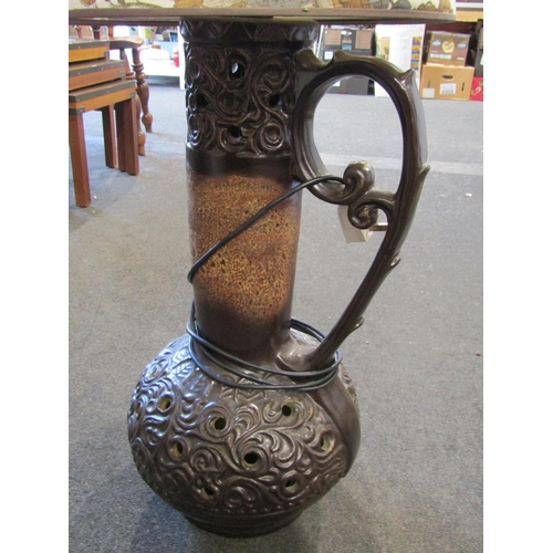 1020 - A 1970's ceramic floor lamp, brown glazed, tall floral design shade, 140cm total