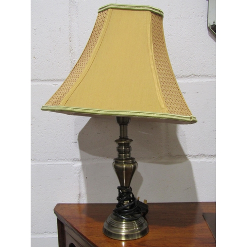 1030 - A pair of 20th Century brushed metal table lamps with beige silk shades